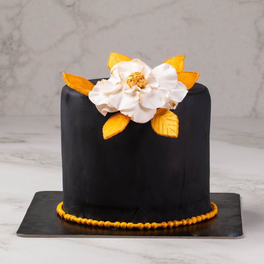 Buttercream cake with flower cascade – CakeInk
